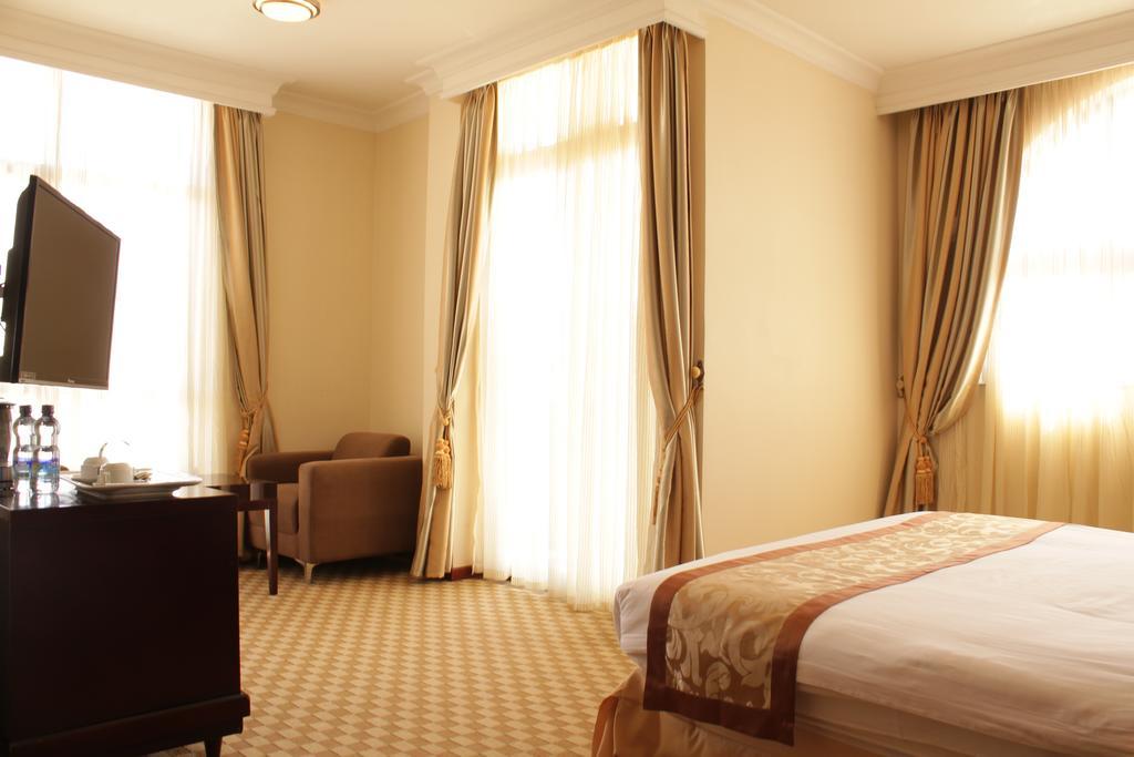 Caravan Hotel Аддис-Абеба Номер фото