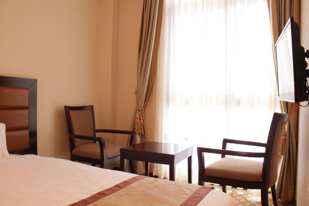 Caravan Hotel Аддис-Абеба Номер фото