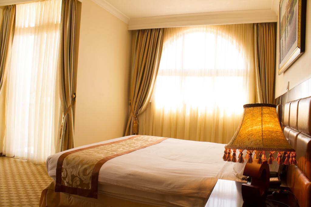 Caravan Hotel Аддис-Абеба Номер фото